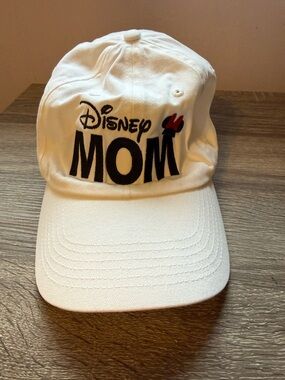 Disney White 'MOM' Cap with Black Embroidery and Red Bow Accent